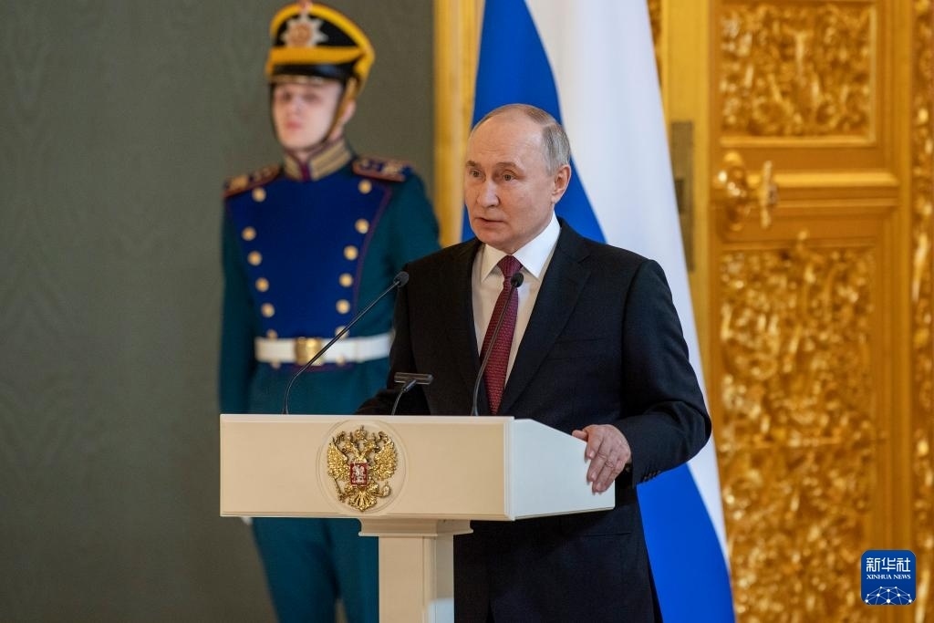 3月20日，俄羅斯總統(tǒng)普京在莫斯科克里姆林宮與其競選團(tuán)隊(duì)代表舉行見面會。新華社記者 曹陽 攝